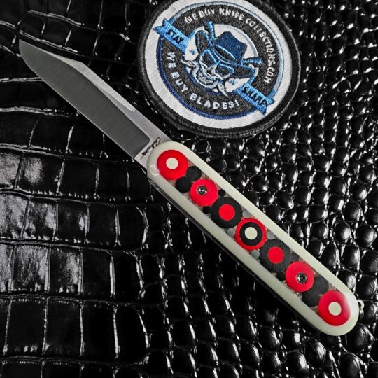 Chuck Gedraitis Switch Army Retro Edition open show side with hand-laid mosaic micarta scales and Nitro-V blade