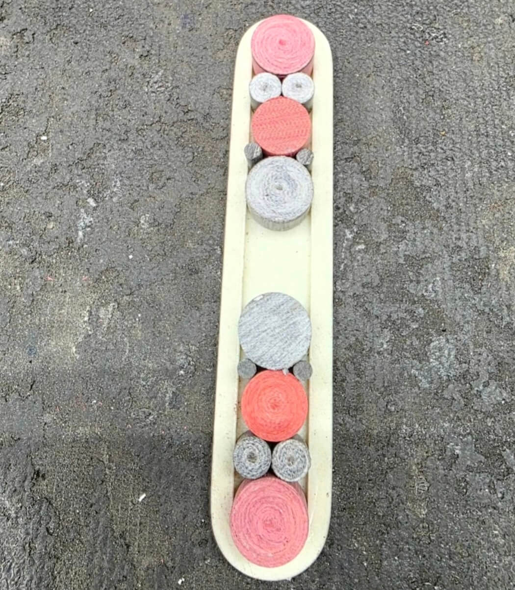Micarta rounds set into the scale blank during construction of the Chuck Gedraitis Switch Army Retro Edition