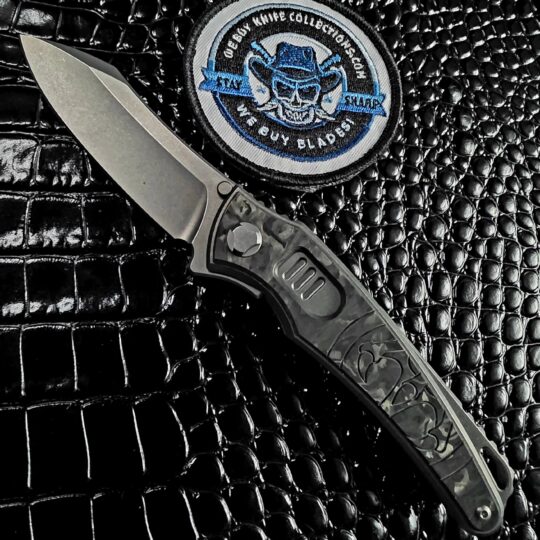 Hawk Knife Designs Talon Auto open show side with Brightwashed M390 blade and Black Ops Marble carbon fiber