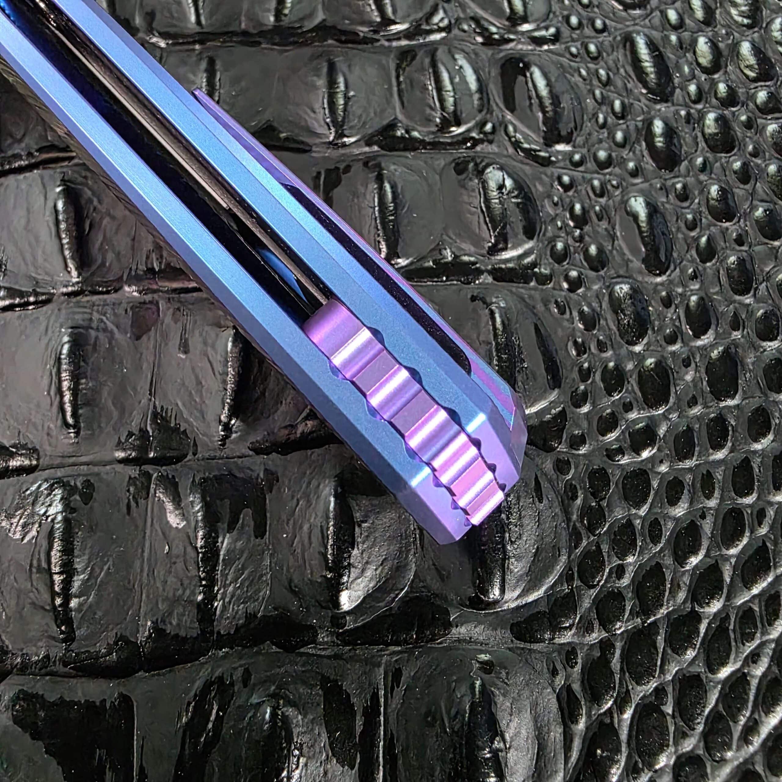 Milled and anodized titanium backspacer on the spine of the Holt Bladeworks Morpheus #1856