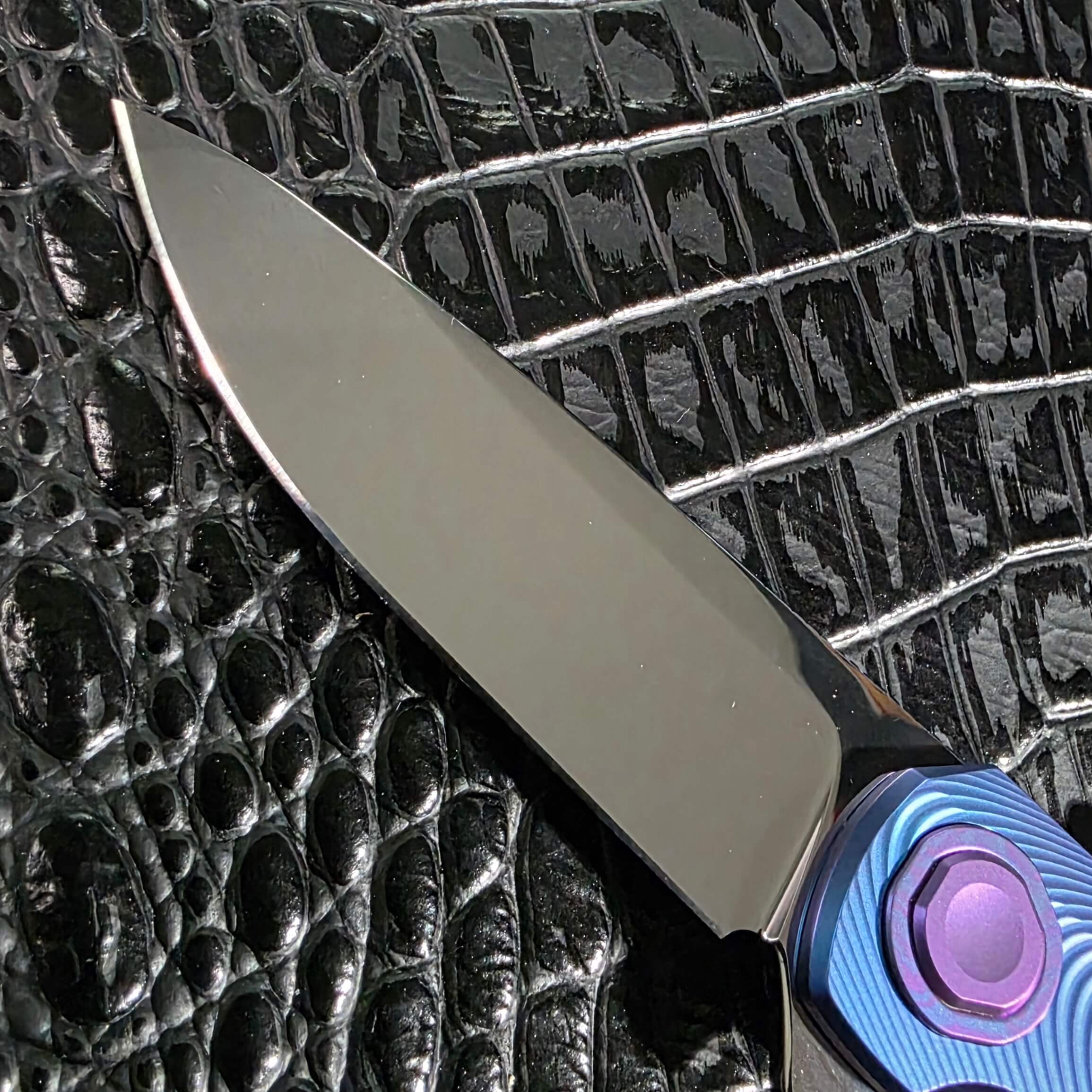 Macro of the Near Mirror finished Uddeholm Vanax SuperClean blade on the Holt Bladeworks Morpheus #1856