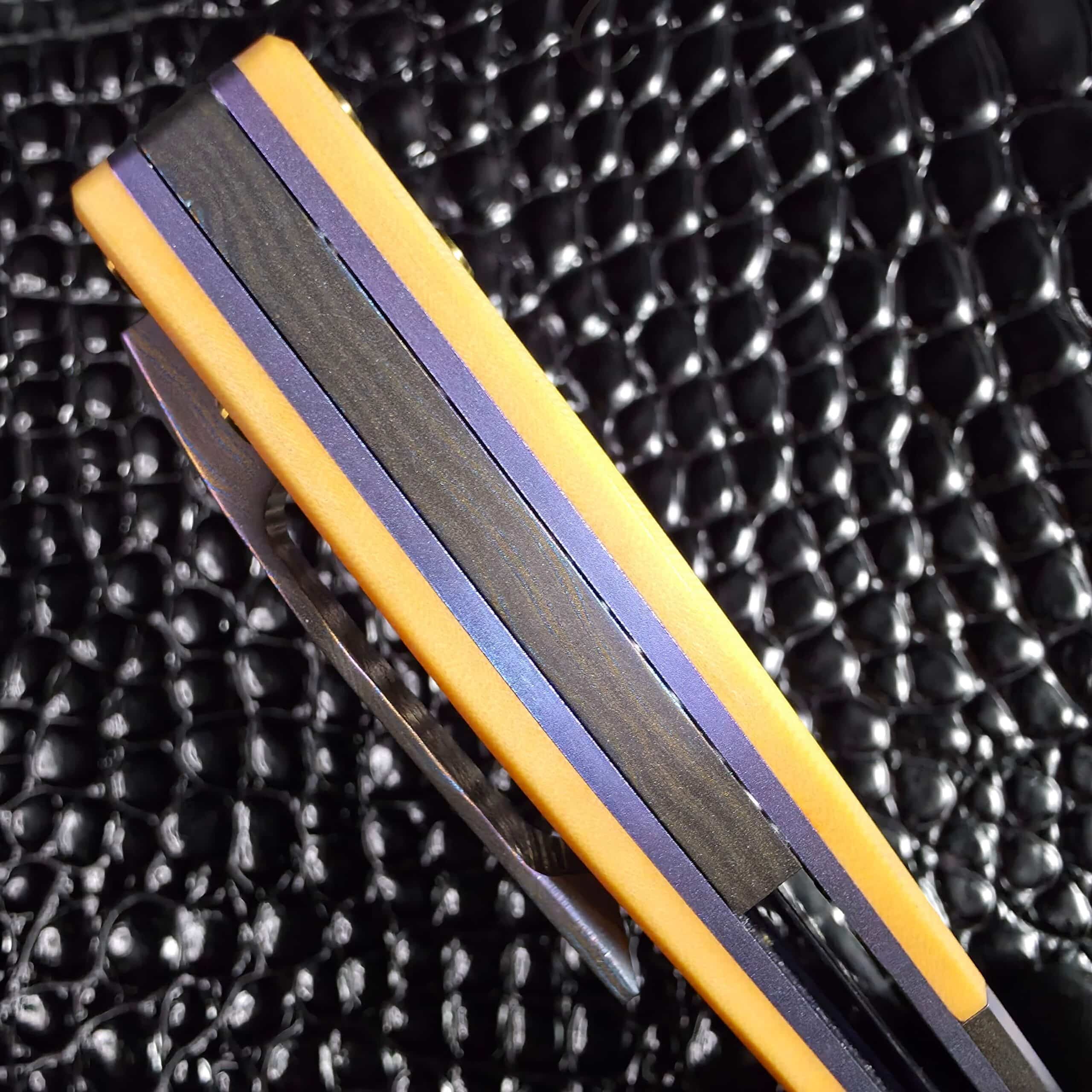 Floated Radmascus backspacer along the spine of a Keanison Bloodhound liner lock