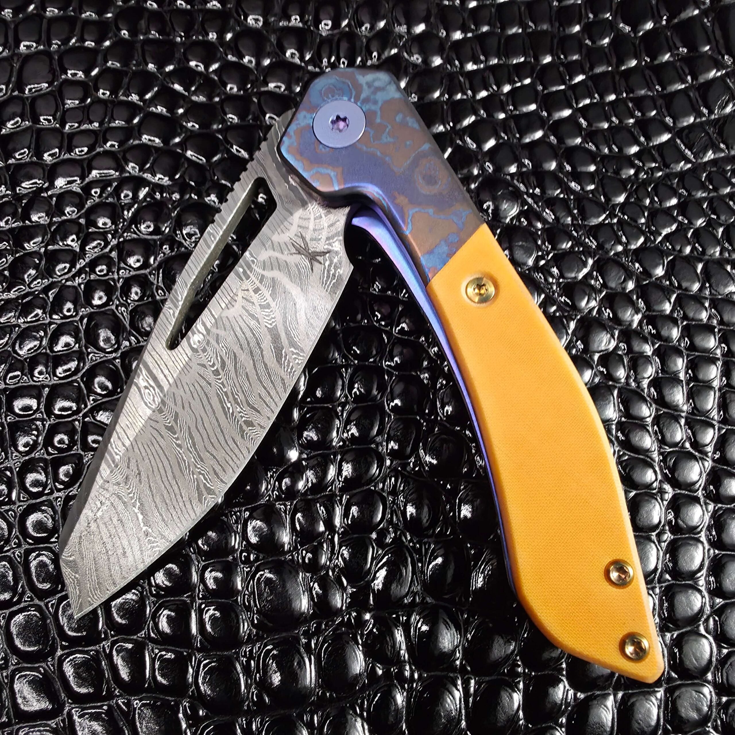 Keanison Bloodhound liner lock #15 half open showing blade travel on Skiff bearings