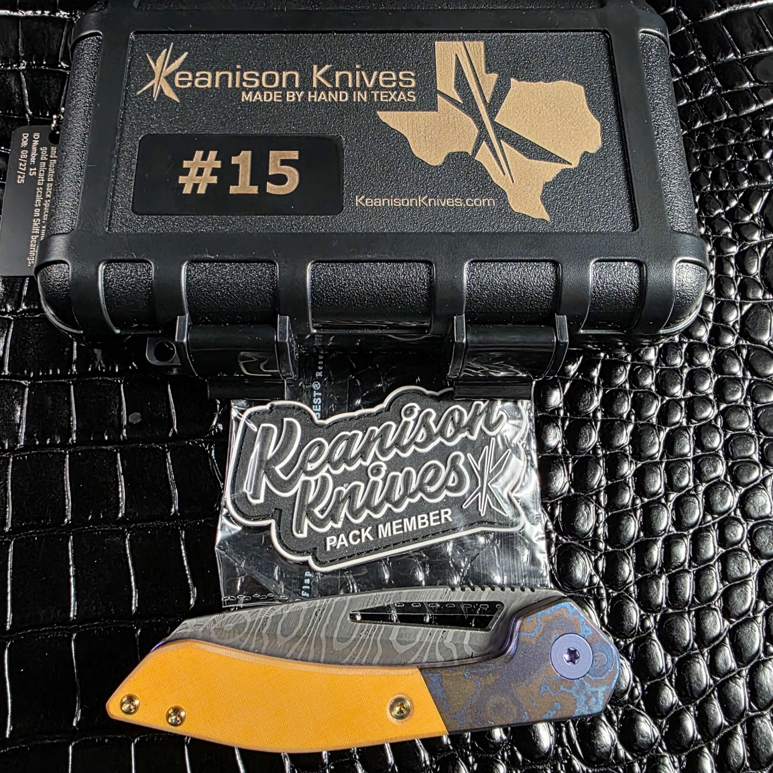 Keanison Knives branded hard case marked #15 with sealed Pack Member patch and the knife