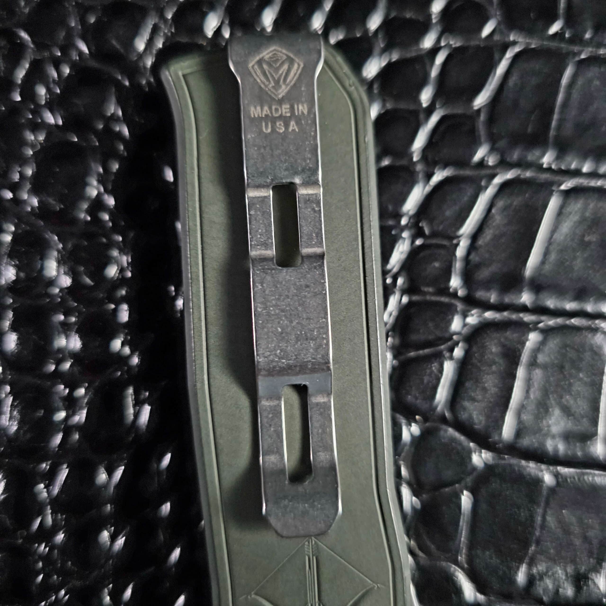 Medford shield logo and Made in USA stamped into the pocket clip of the Merc-1 OTF