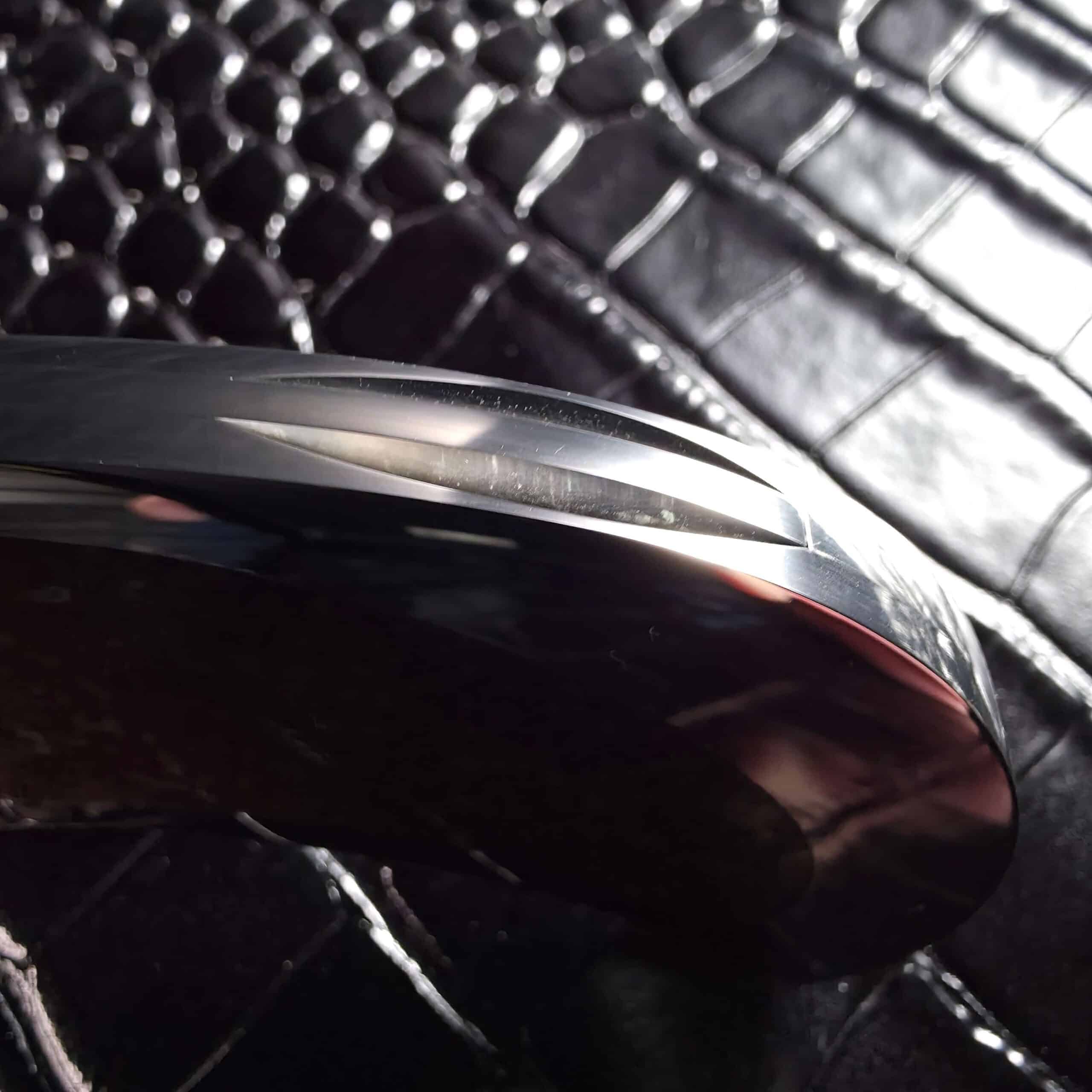 Lockback release cut into the polished 416 stainless spine of the Scott Gallagher Escalante Inter Frame Folder