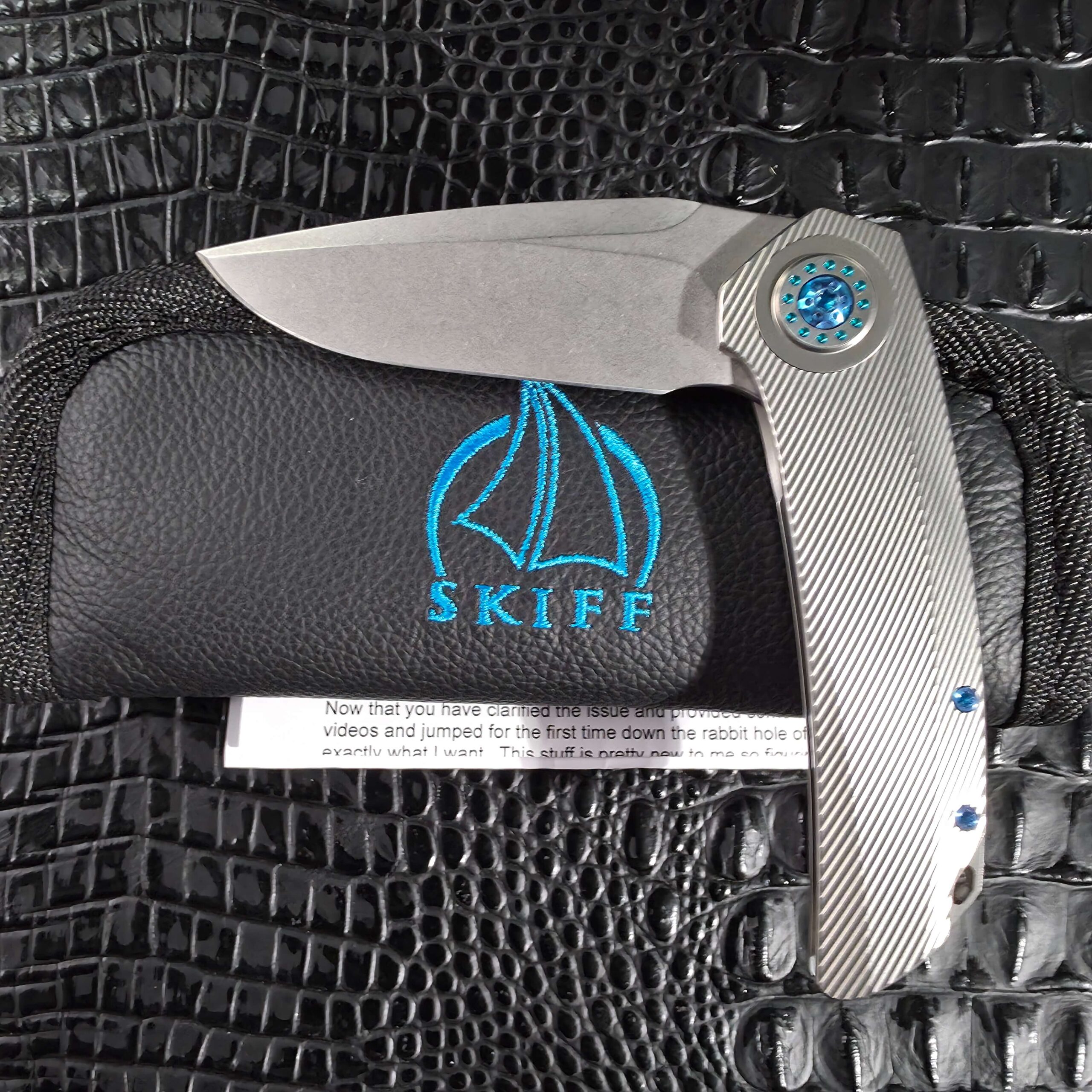Skiff Made Blades Fugitive #0113 with its original Skiff logo zippered pouch and the original order email documentation