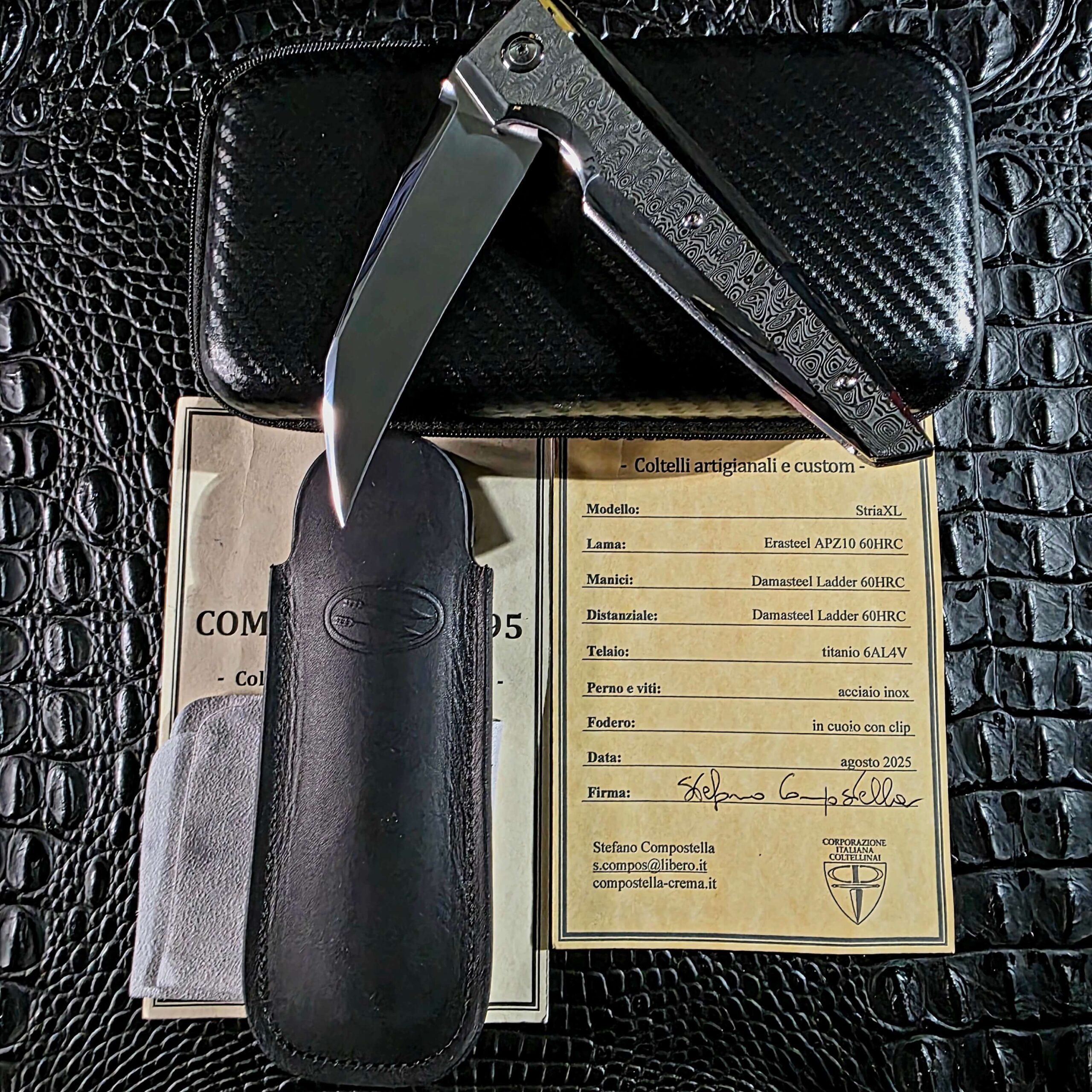 Stefano Compostella StriaXL with complete original accessories including signed Compostella 1895 certificate of authenticity, zippered carry case, black leather slip sheath, and polishing cloth