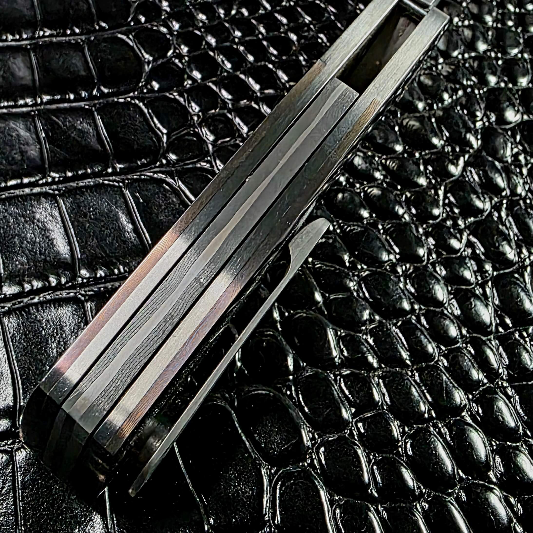 Spine view of the closed Todd Fischer Kamehameha showing frame edges and channel