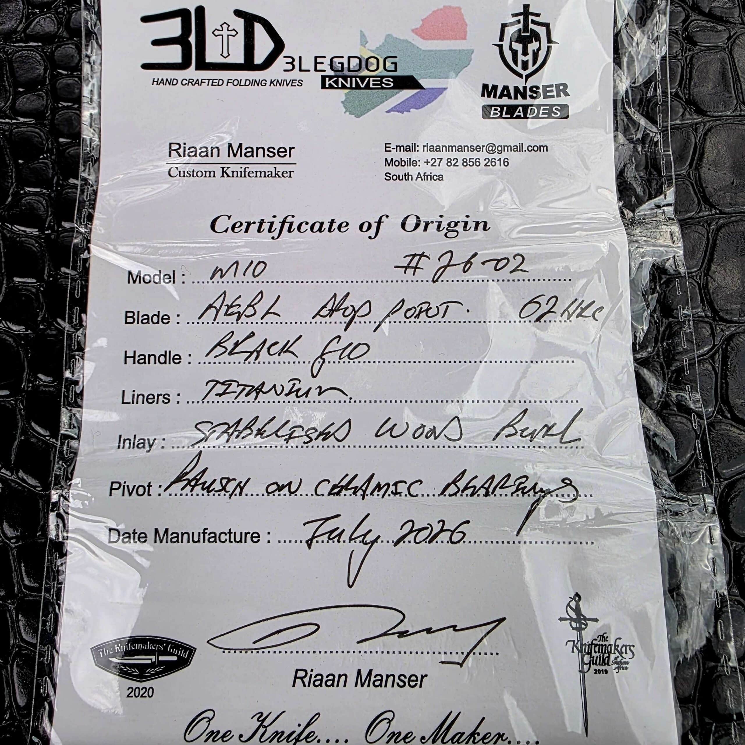 Signed 3LegDog Certificate of Origin for the M10 serial 26-02, listing AEB-L at 62 HRC