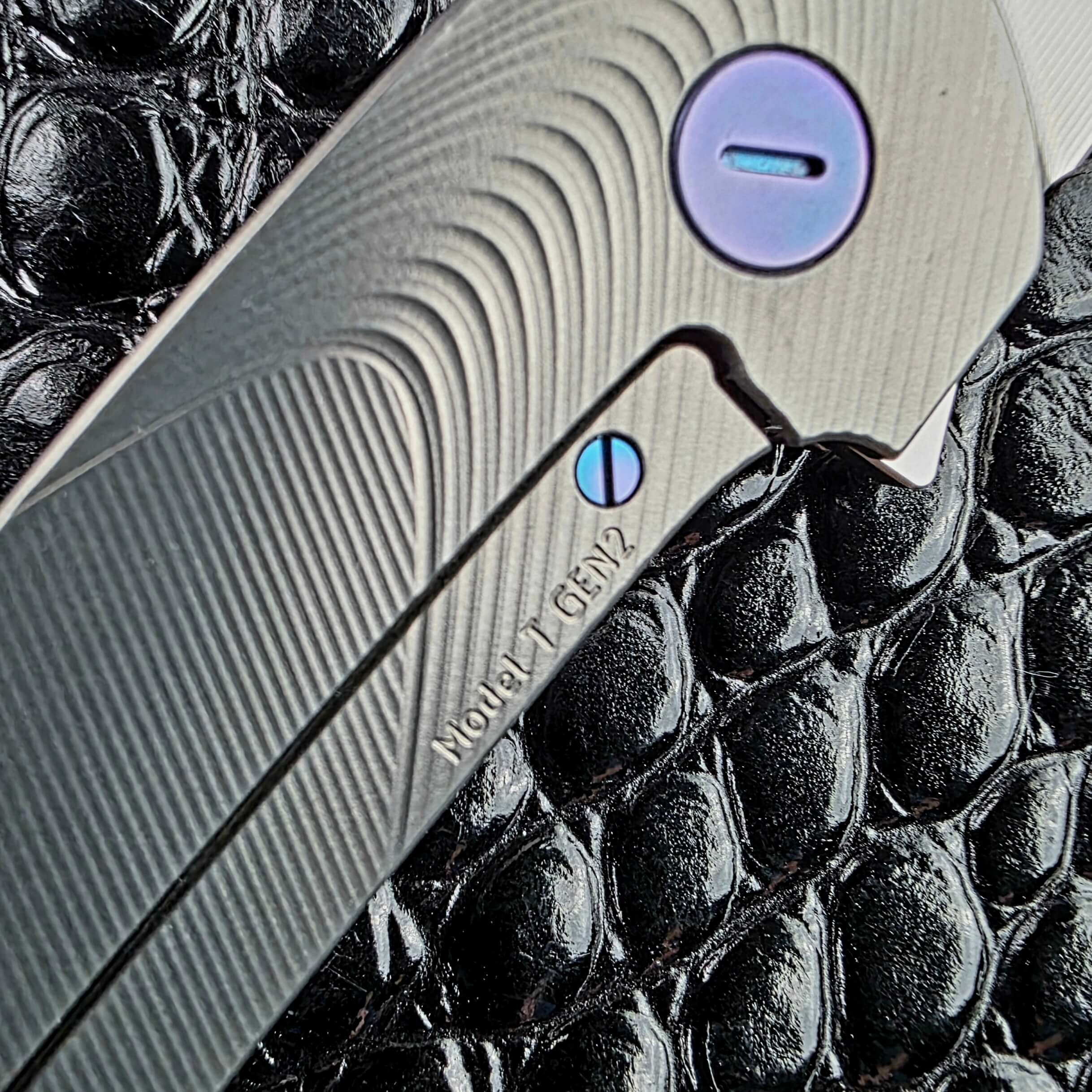 Flathead screwdriver-style pivot anodised Blue Chameleon on the Hog House Model T Gen 2