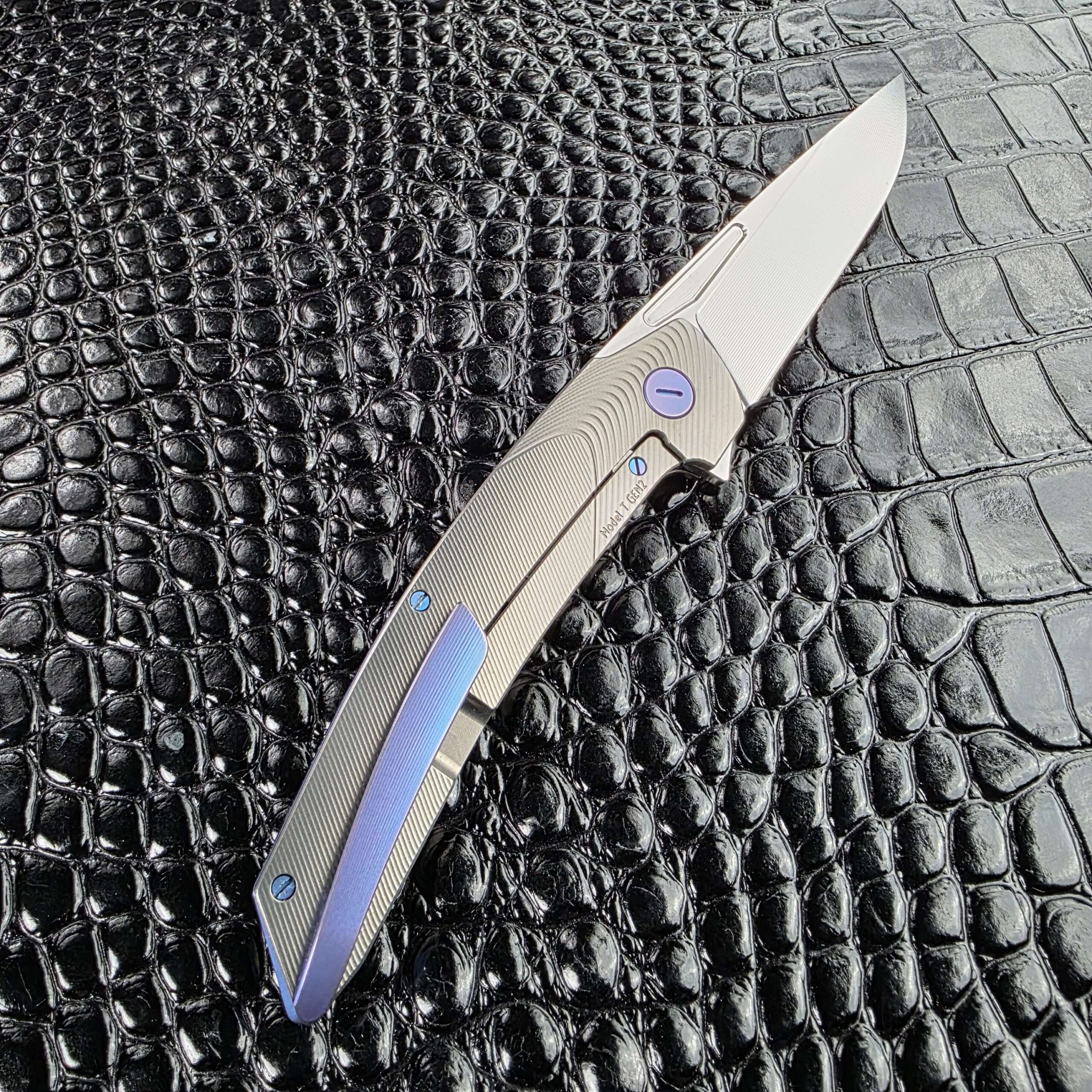 Full open profile of the Hog House Model T Gen 2 in Gunmetal titanium