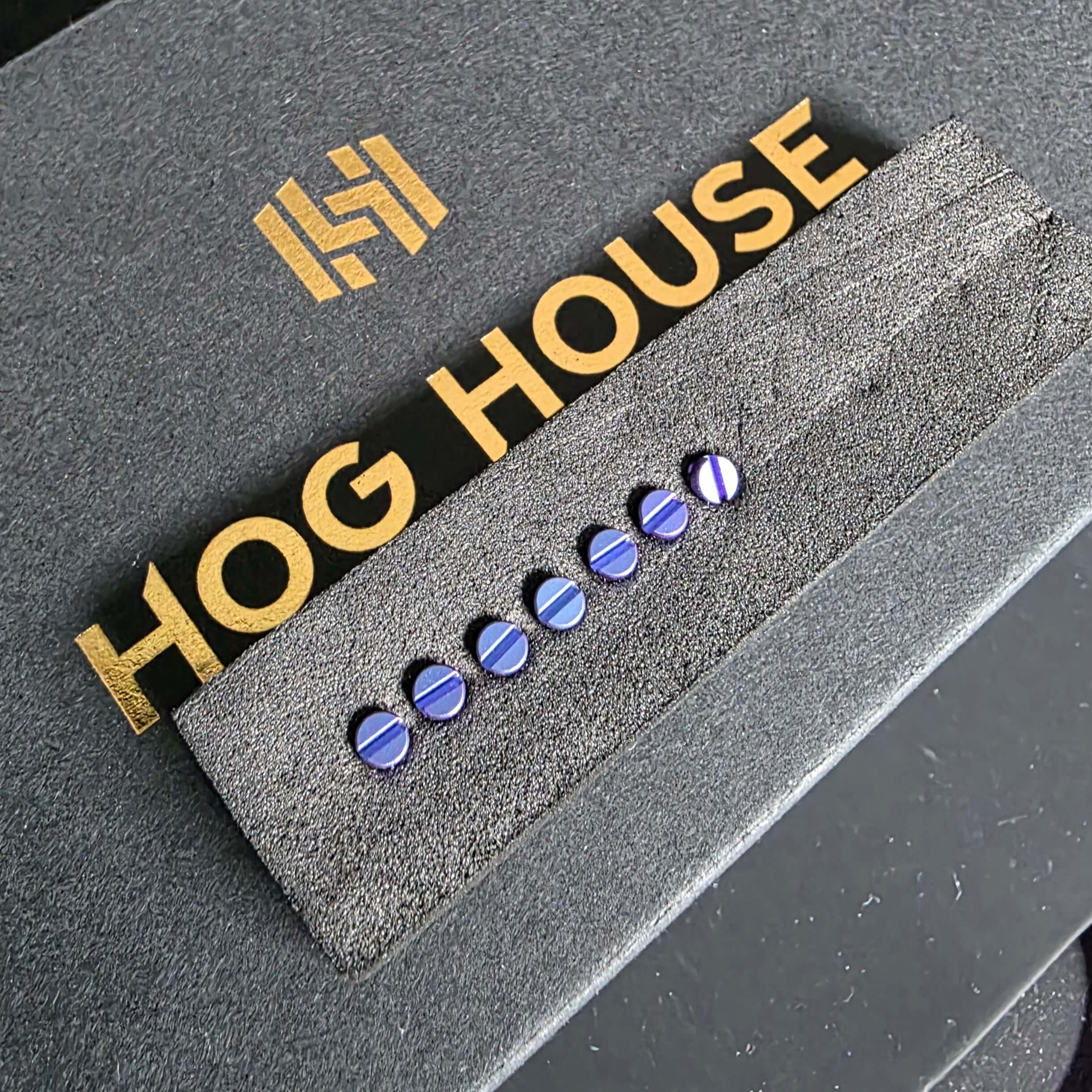 Spare set of Blue Chameleon anodised screws included with the Hog House Model T Gen 2