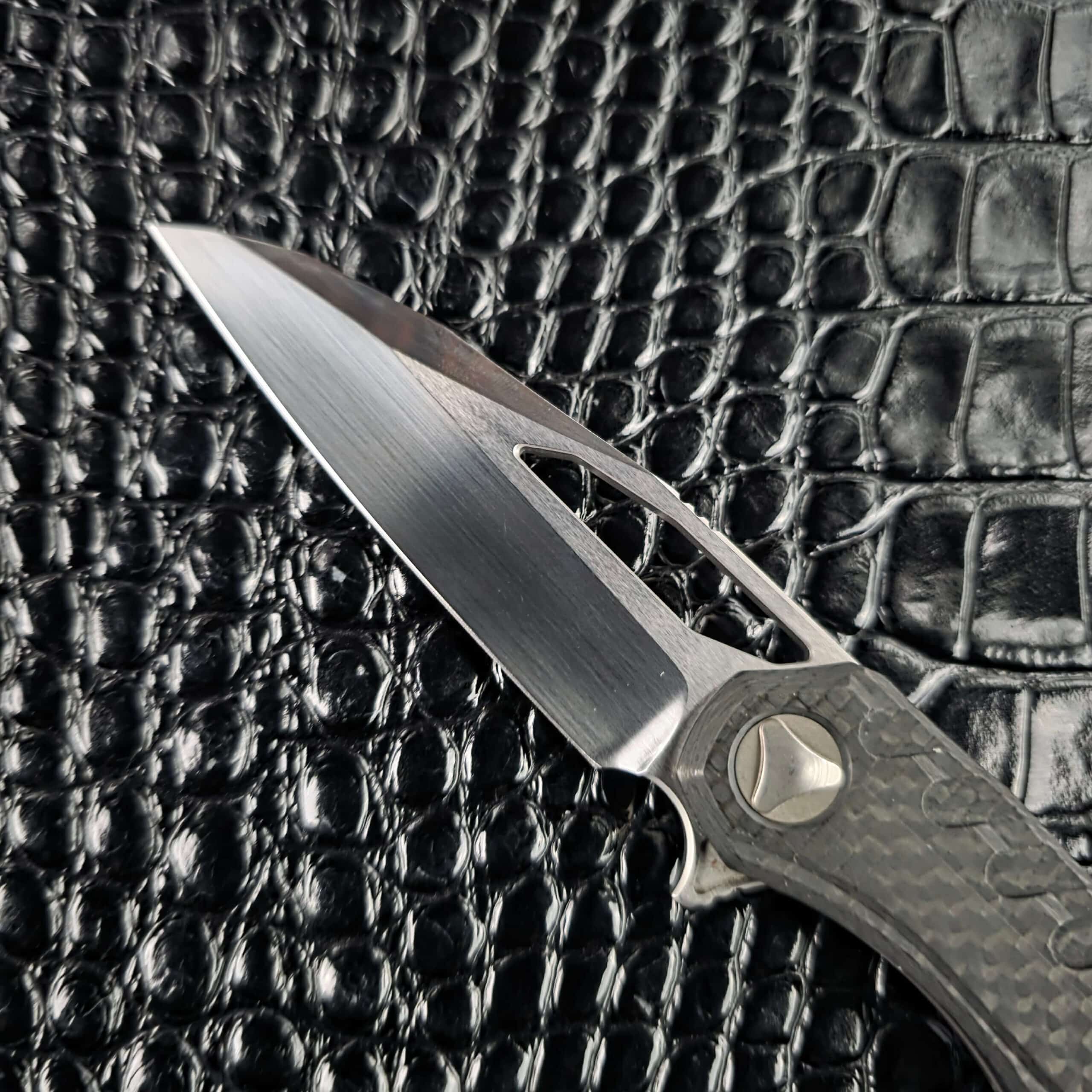 Tip and grind line of the hand-rubbed satin Elmax blade on the Marfione Custom Sigil