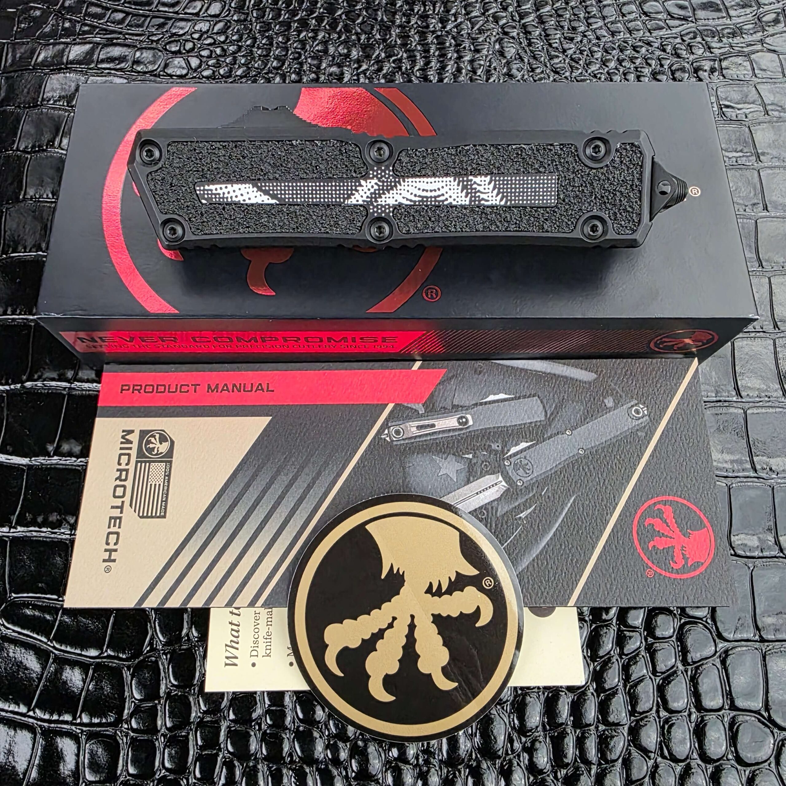 Microtech Scarab II Gen III with its factory box, brochure, warranty card and decal
