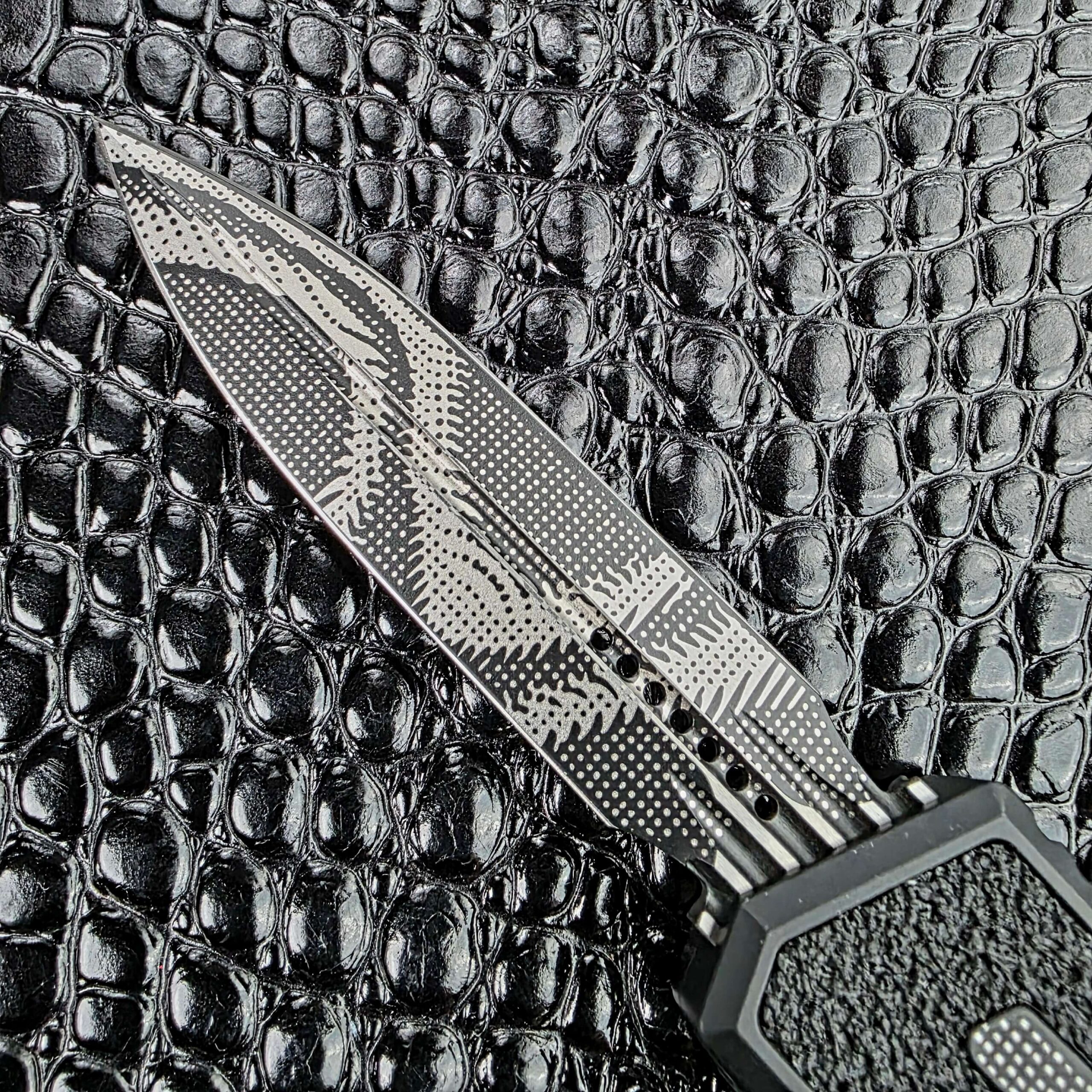 Geo Trace Camo D/E dagger blade on the Microtech Scarab II Gen III