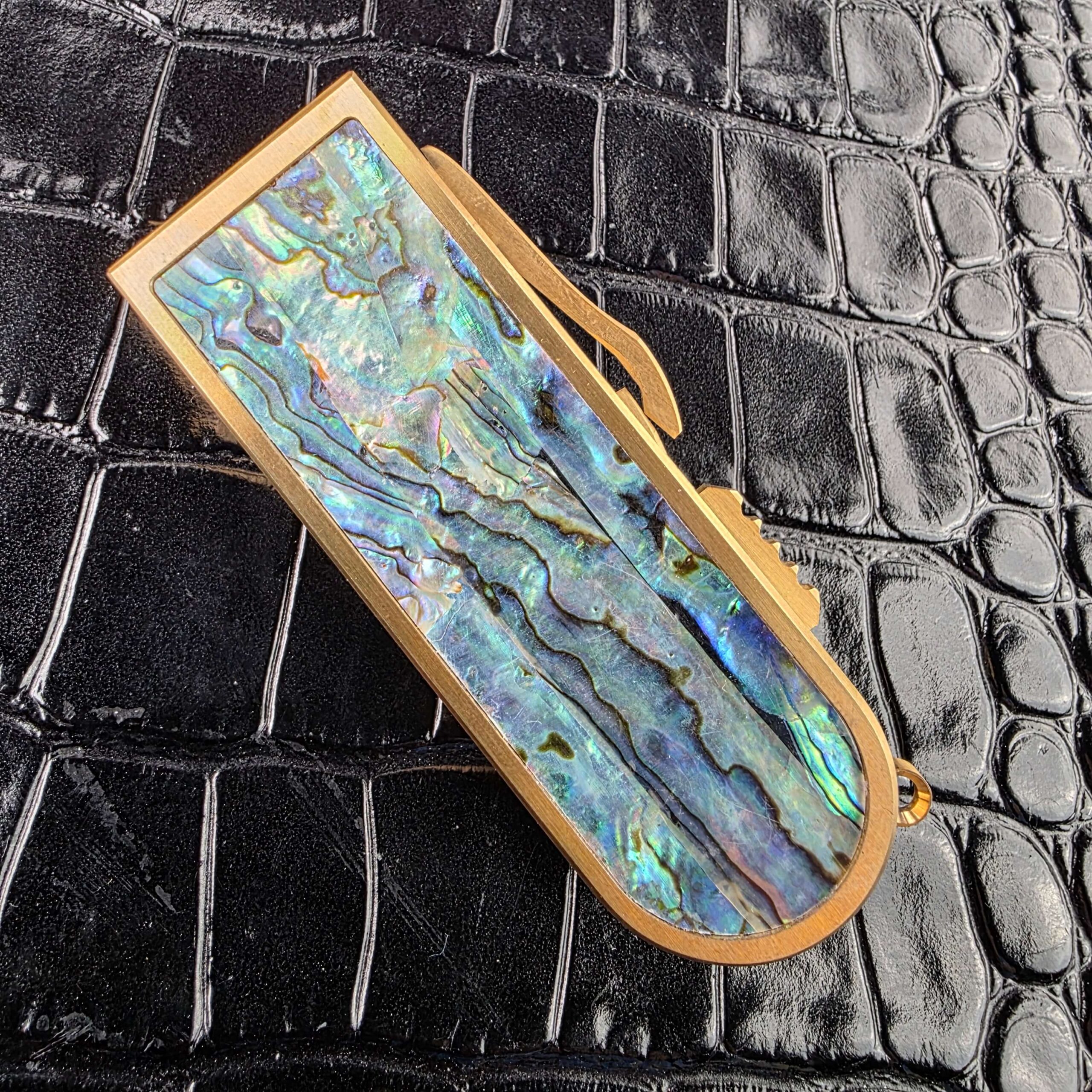 Abalone scale on the closed Miroc Razor Knife OTF Automatic Custom