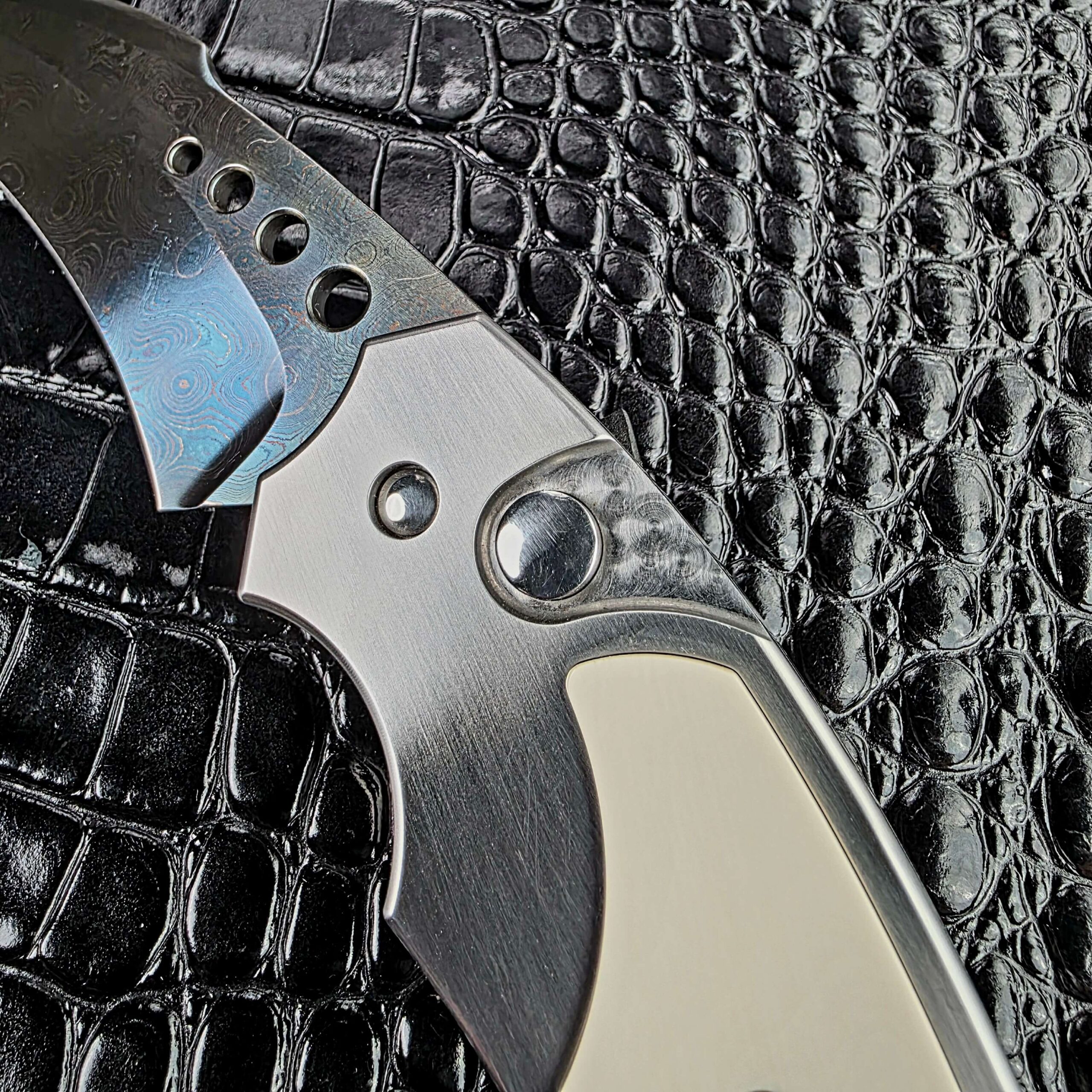 Firing button and pivot in the stainless bolster of the Reese Weiland Large Rastor