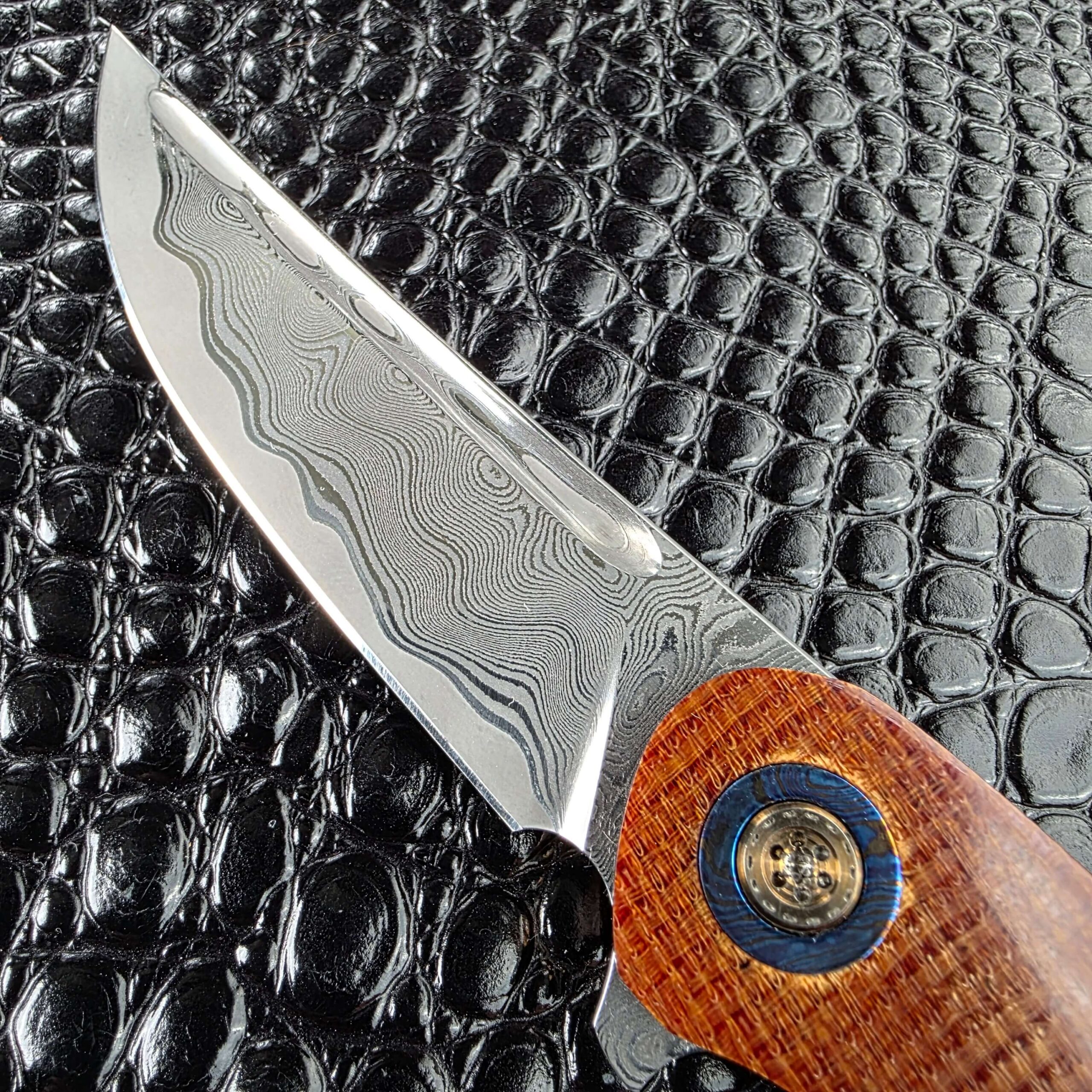 Stylized fuller cut to follow the san mai lamination line on the Andriy Mozil Model 23-26
