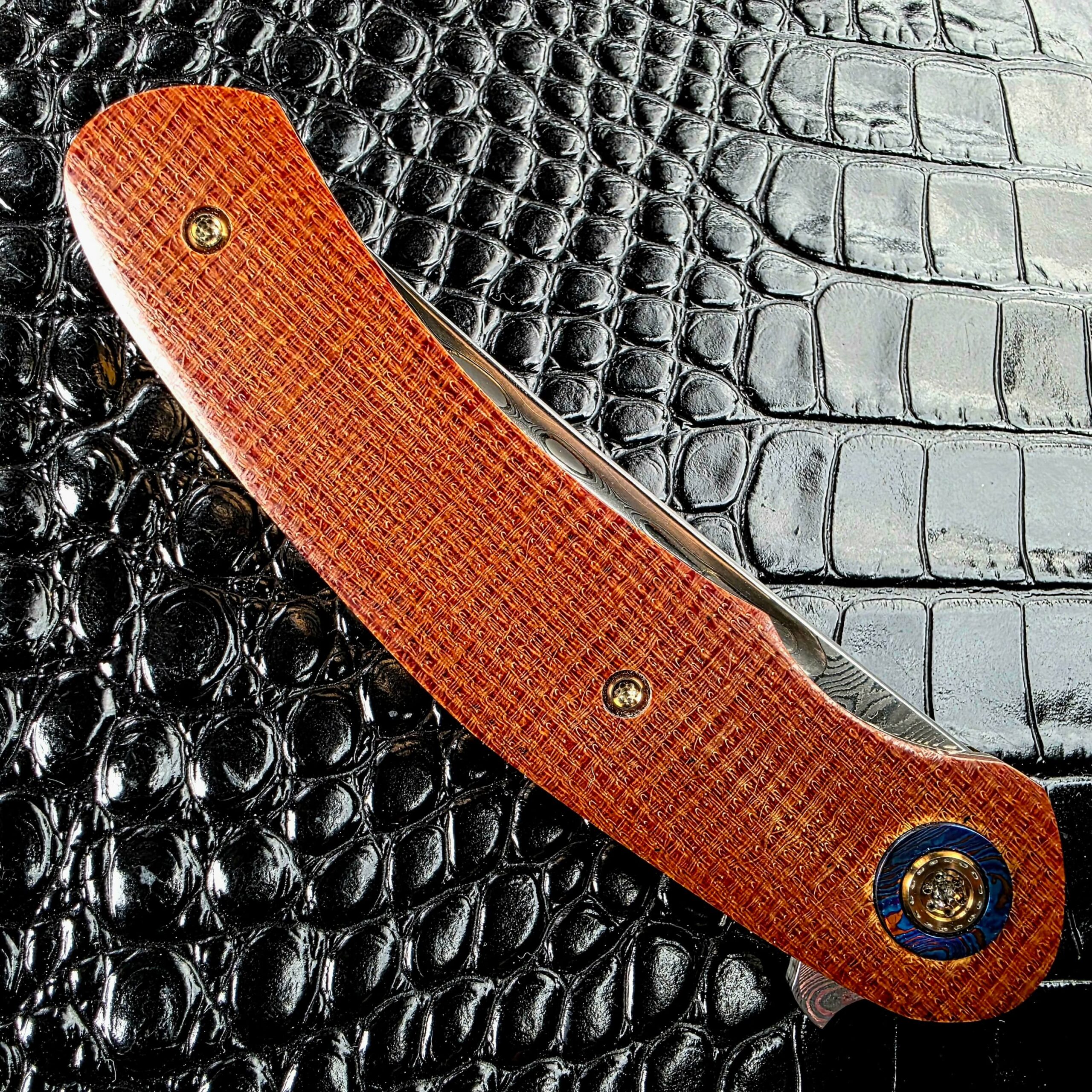 Canvas Micarta scale on the Andriy Mozil Model 23-26