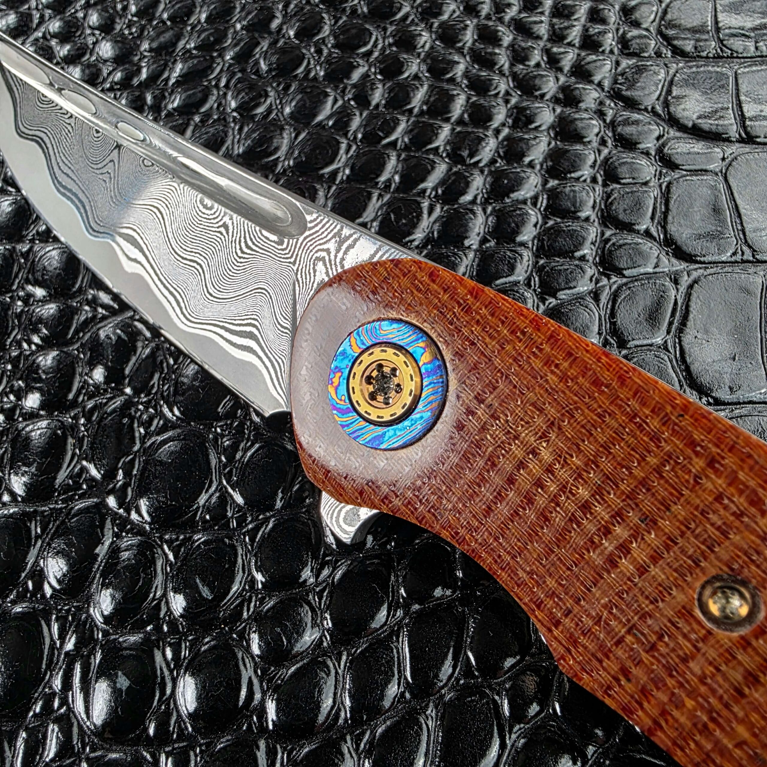 Andriy Mozil Model 23-26 open from the clip side showing the liner lock and flipper tab