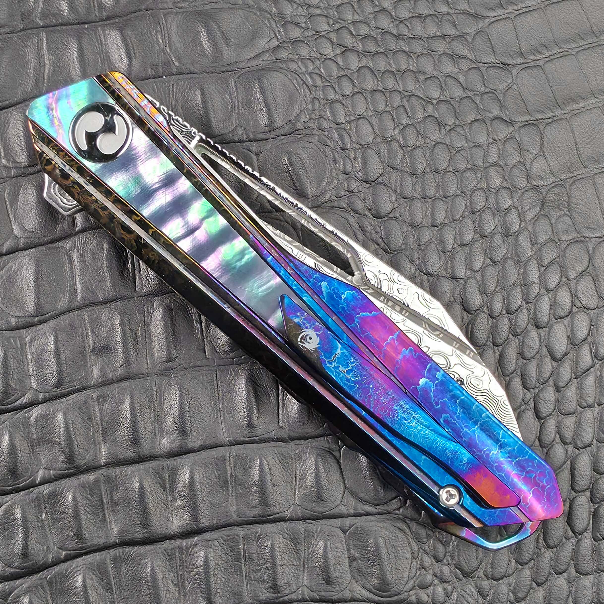 Cosmic Storm Titanium pocket clip and butt of the Dew Hara Kabuki, clip side