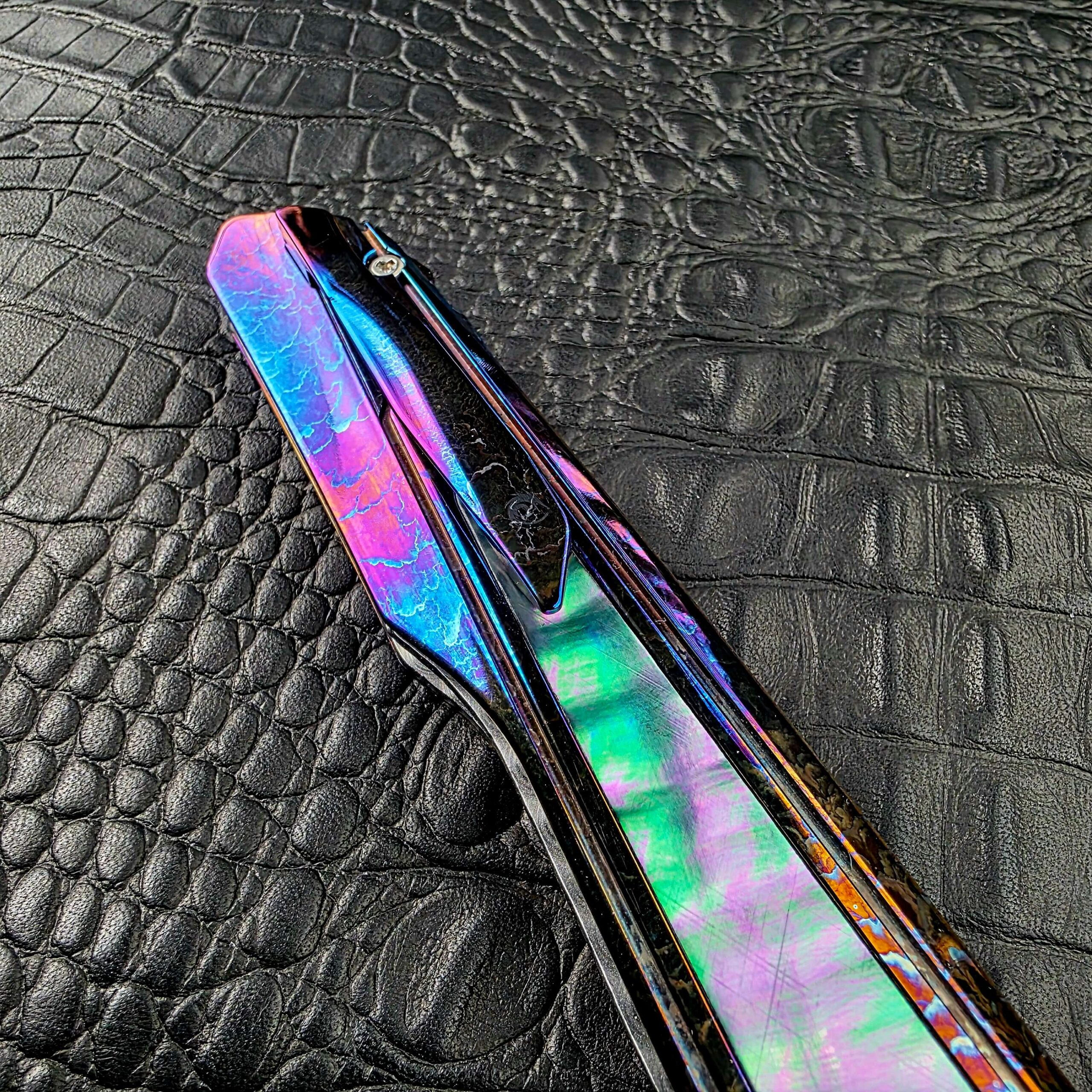 Cosmic Storm Titanium pocket clip and butt of the Dew Hara Kabuki, clip side
