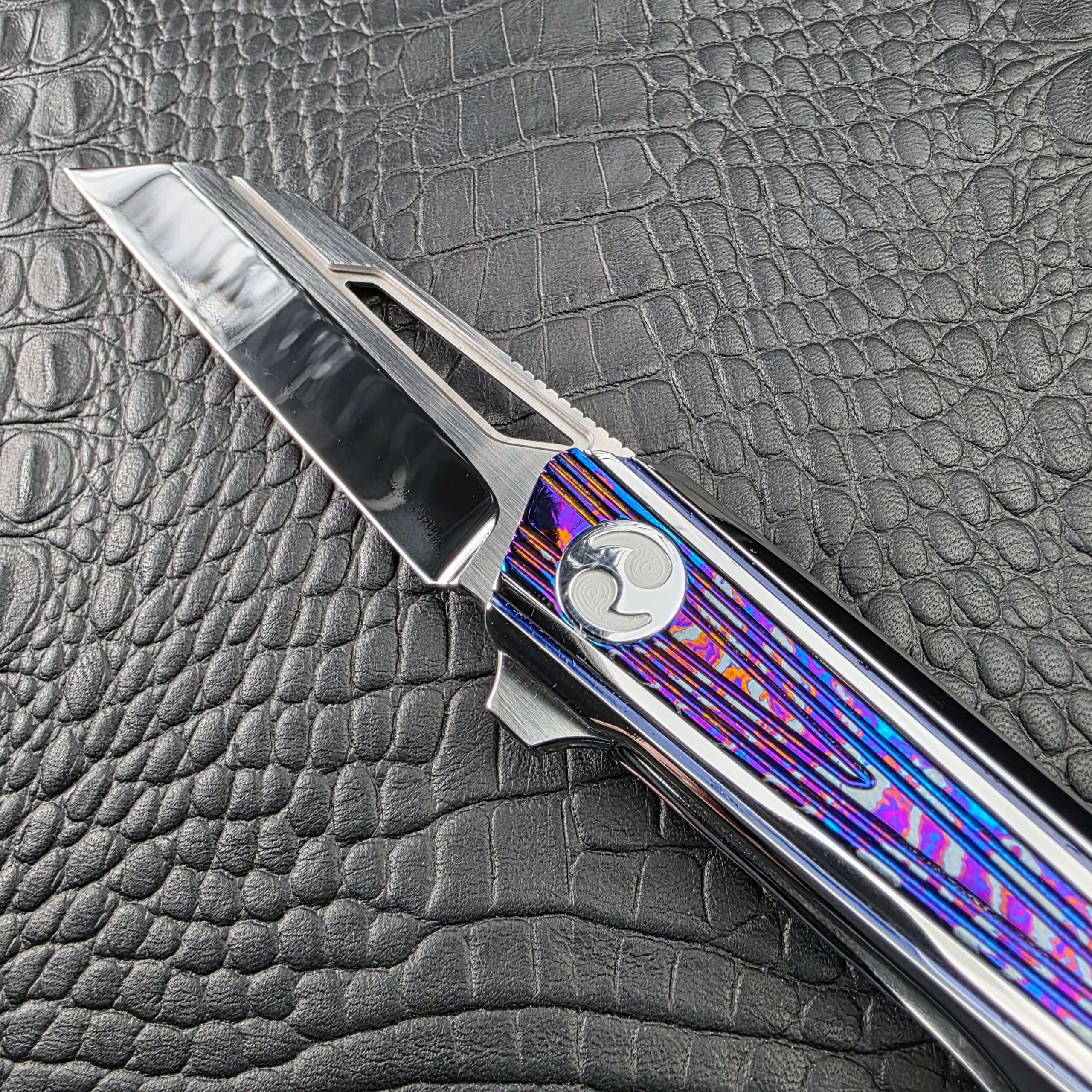 Zircuti inlay, pivot and flipper tab of the Dew Hara Kabuki