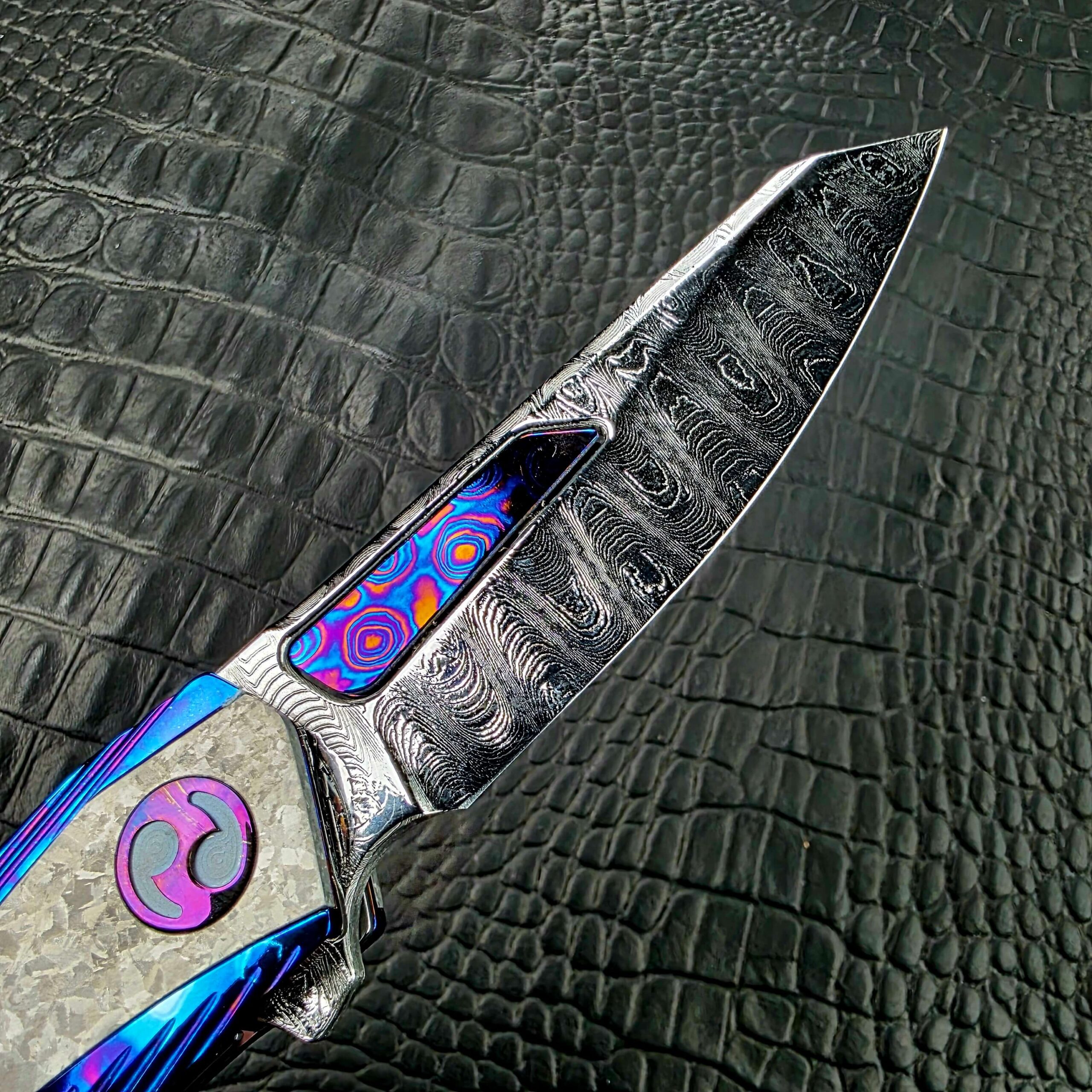 Deep etched Sharktooth Damascus at the point of the Dew Hara METEOR blade