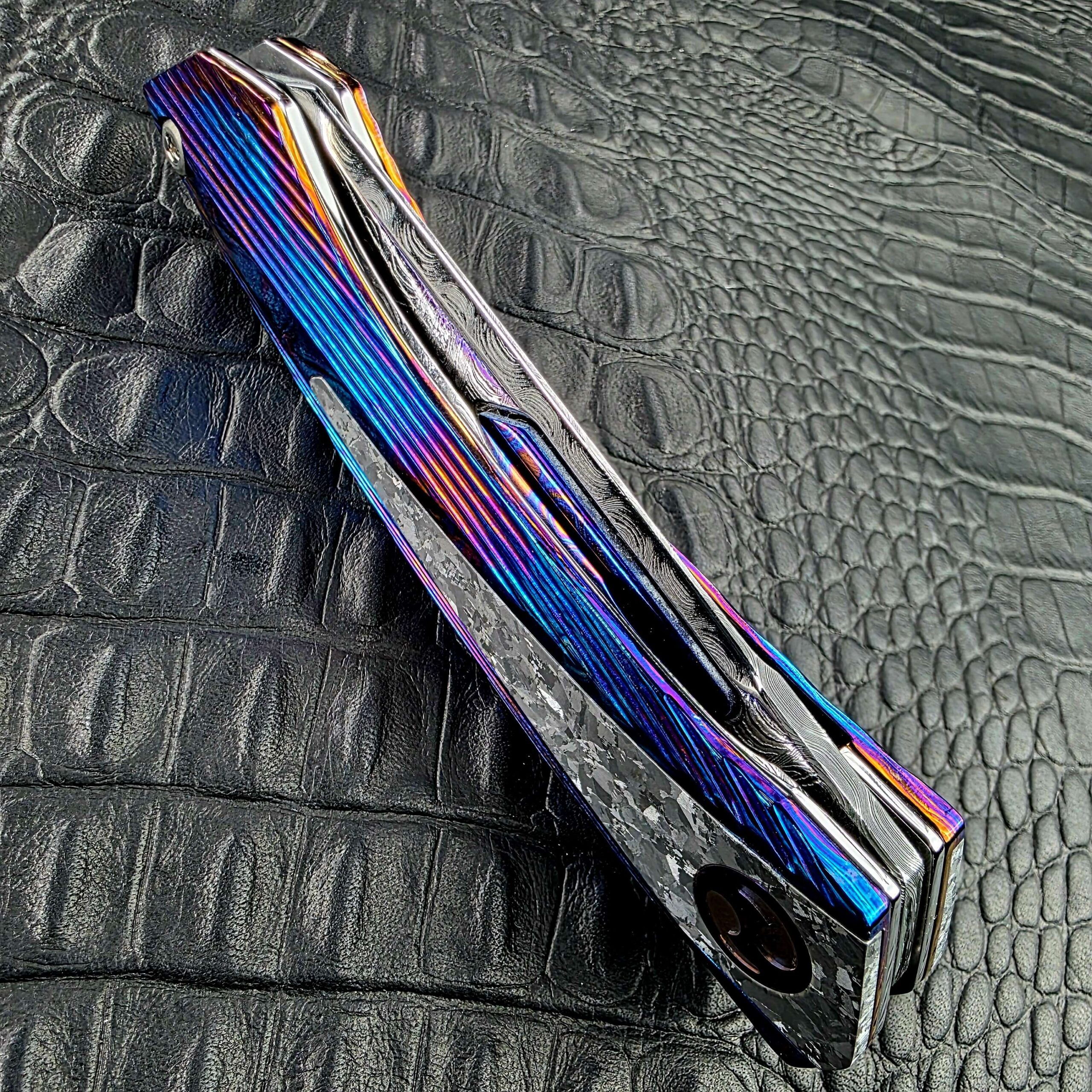 Grooved Timascus frame and Crystallized Titanium panel along the closed Dew Hara Sharktooth Damascus METEOR
