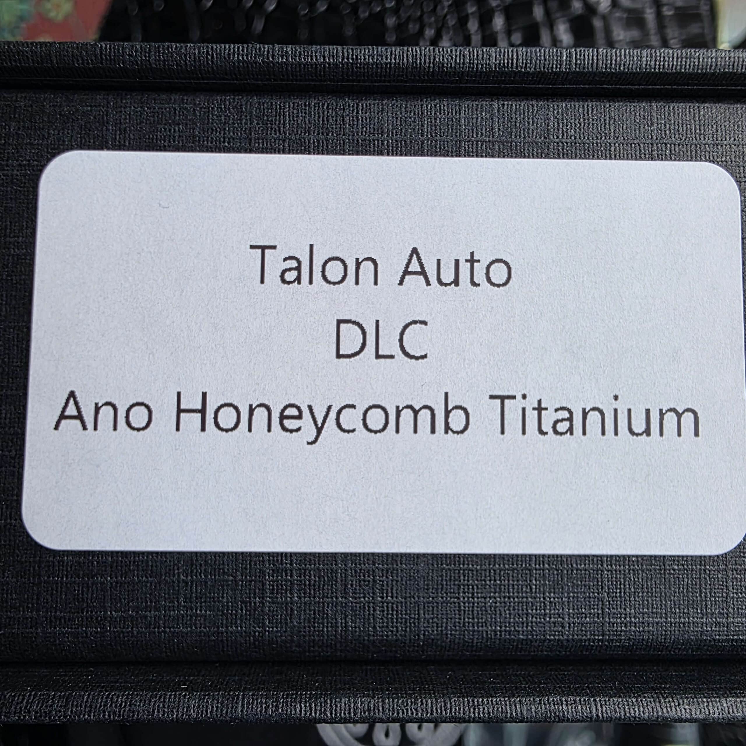 Hawk Knife Designs factory box label reading Talon Auto DLC Ano Honeycomb Titanium