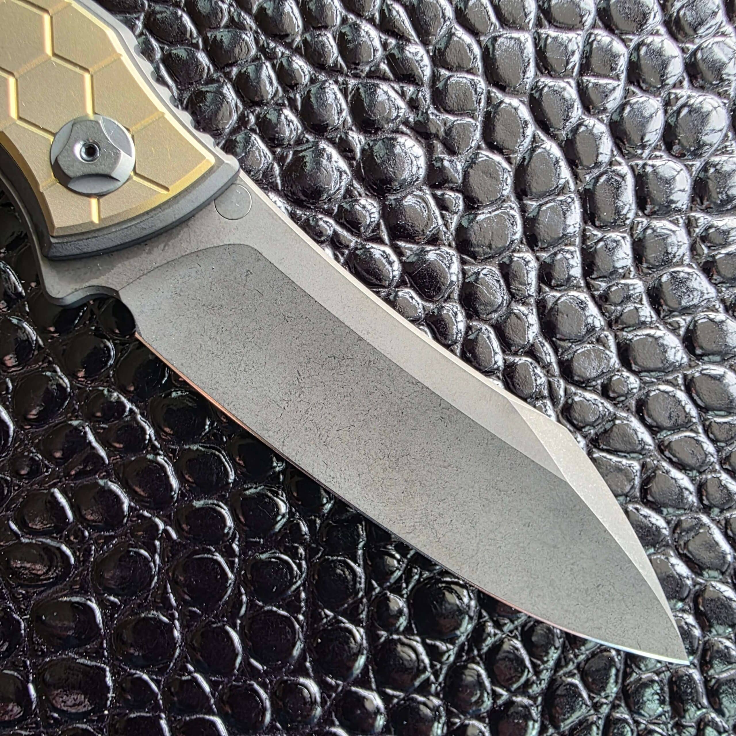 Hawk Talon Auto sheepsfoot blade profile in direct sunlight, Bohler M390 with DLC coating