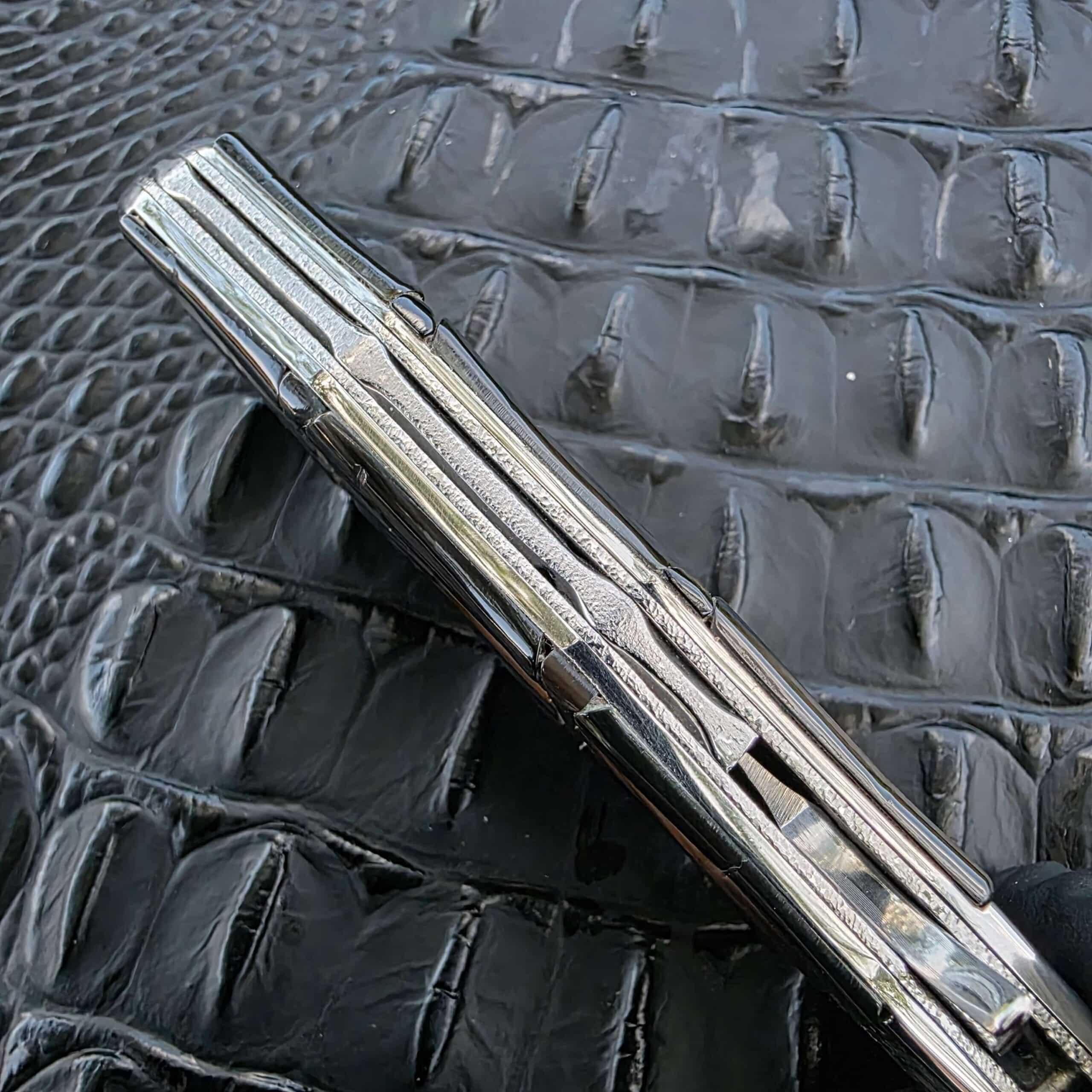 Spine view of the Koji Hara Take Flipper showing the backbar carved to resemble bamboo