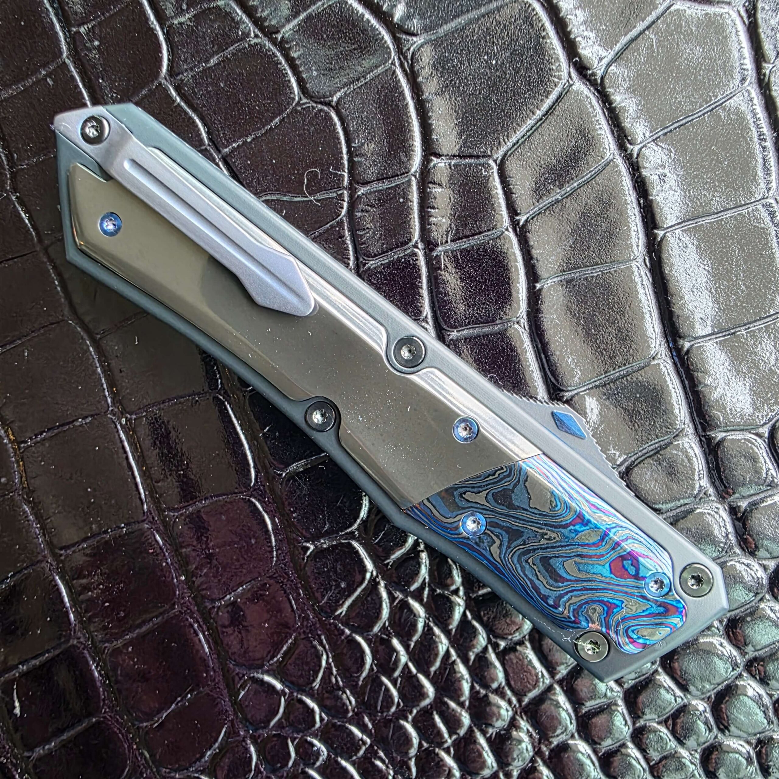 Patrick Famin GOTF Mini closed on the clip side showing the titanium clip along the handle