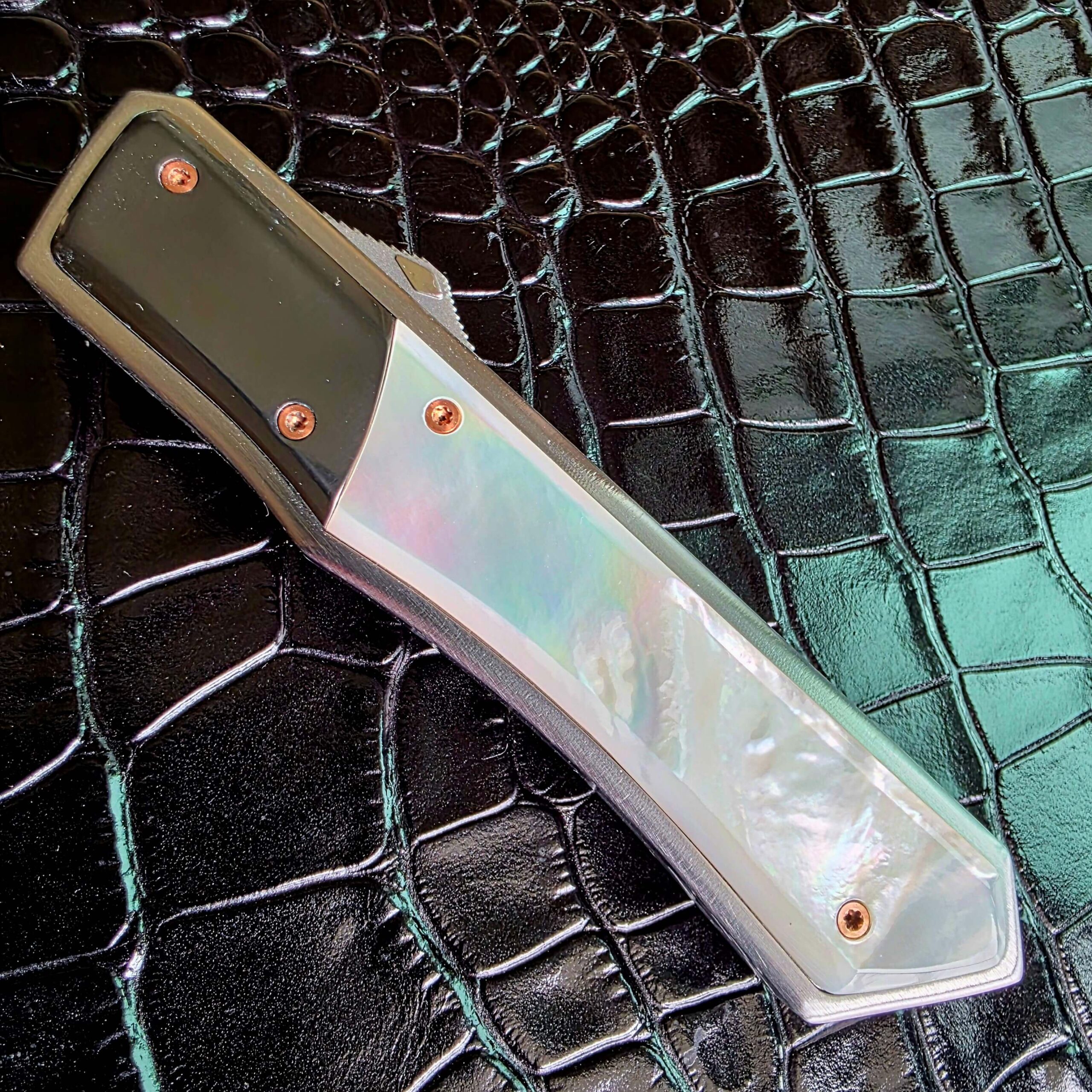 Patrick Famin Mother of Pearl G.O.T.F. Mini closed, show side, with the full mother of pearl panel visible