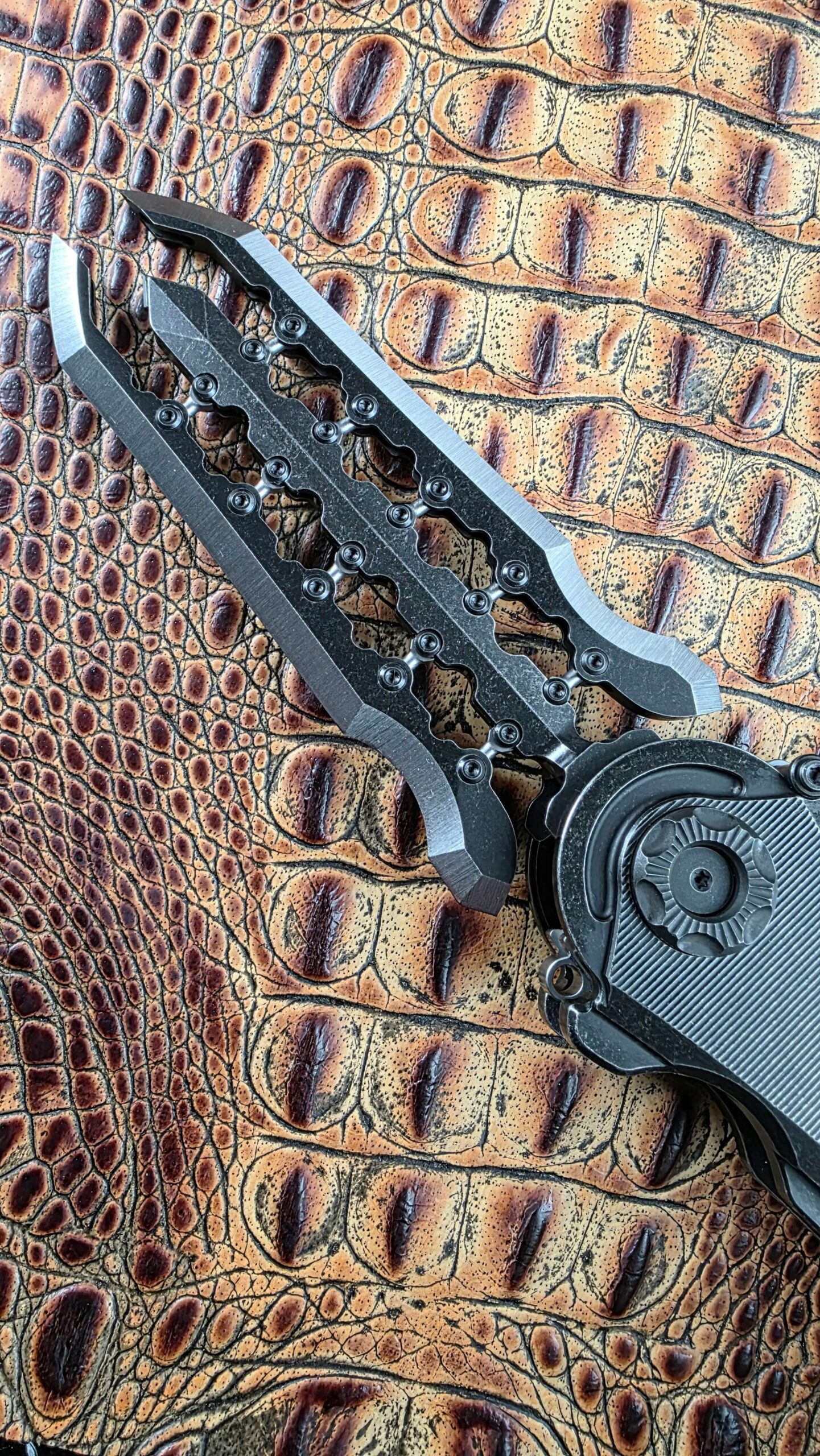Poikilo Blade AL-Khem photographed vertically with the blade expanded into three sections