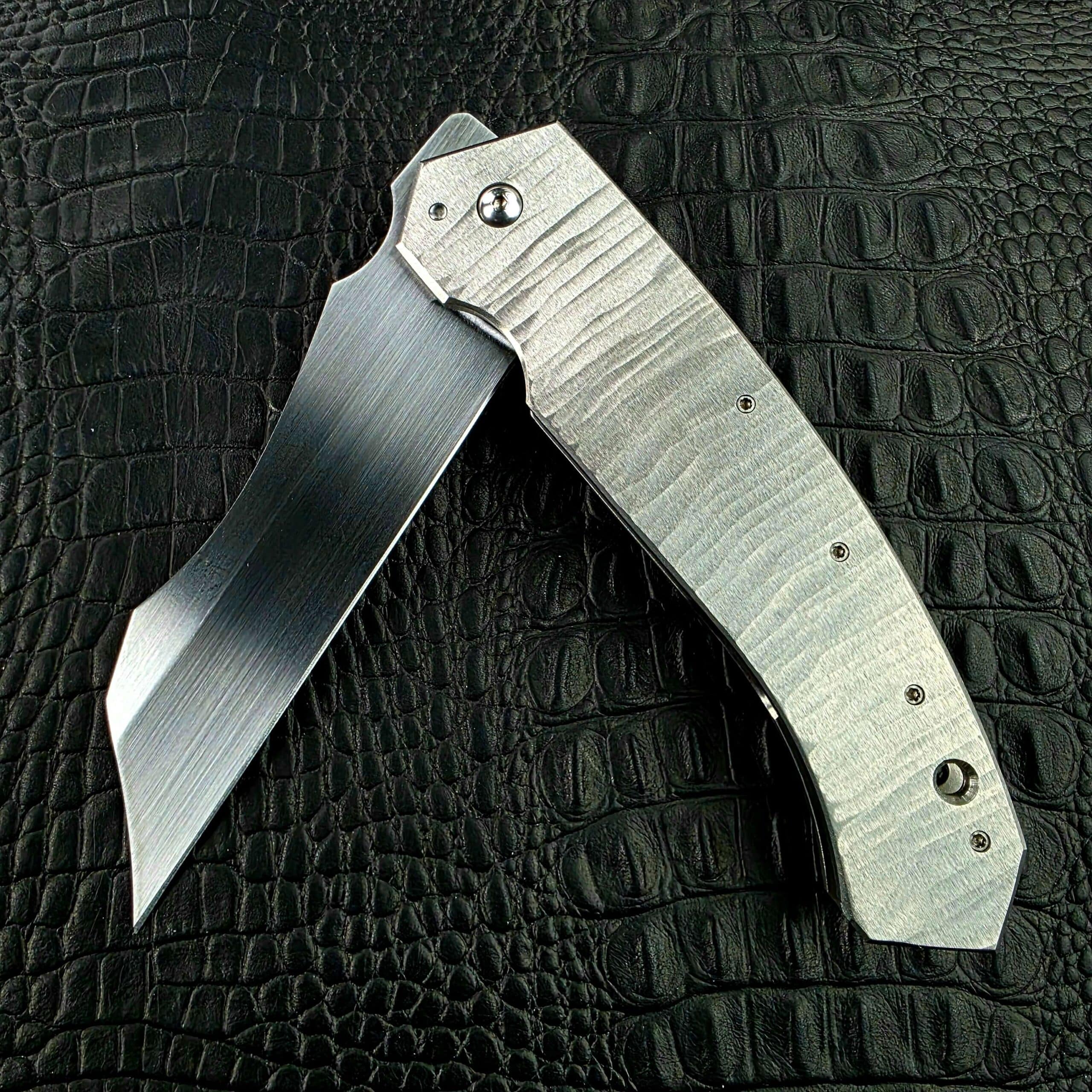 Reese Weiland Strike Prototype 2 with the blade half open, show side
