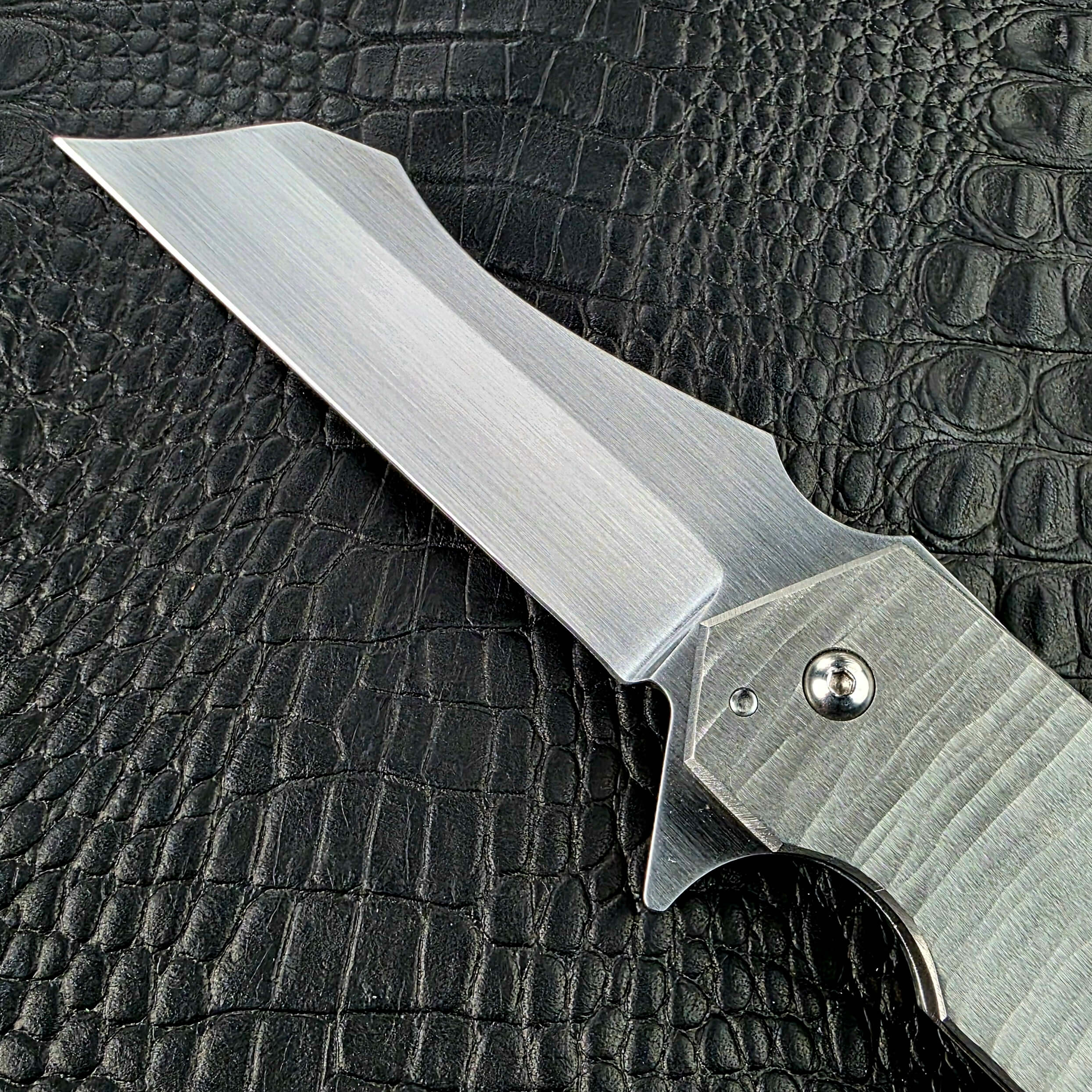 Satin CPM 154 Wharncliffe blade of the Reese Weiland Strike Prototype 2 at the pivot